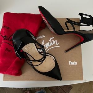 Christian Louboutin strappy heels.
